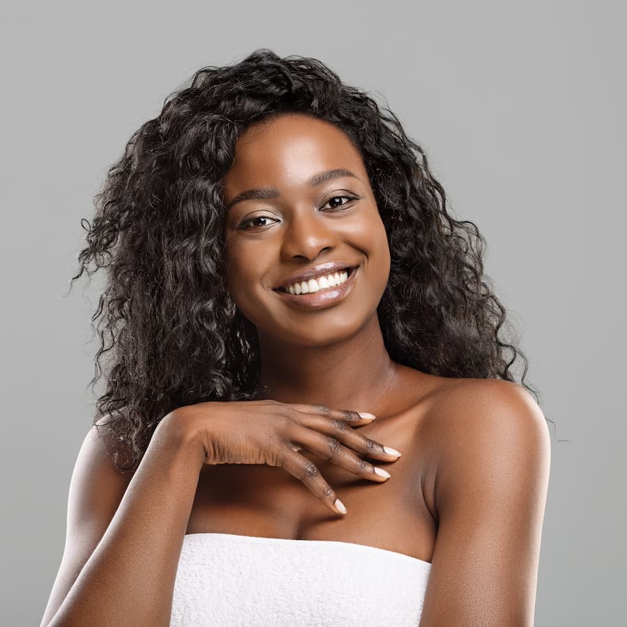 Portrait of a woman with perfect skin and nude makeup