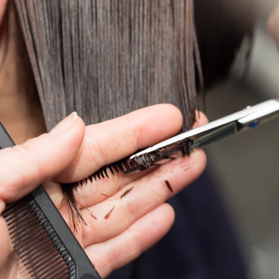 cutting hair in a beauty salon